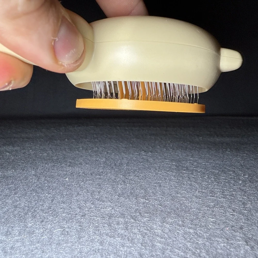 Effortless Pet Grooming with Paw Shaped Self-Cleaning Brush for All Pets